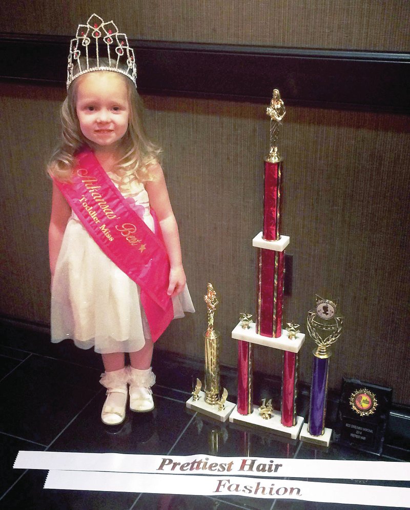 Submitted Photo Brinley Estep, 2, current reigning Miss Gravette Tiny Tot and daughter of Derek and Breana Estep, brought home another crown. Estep was crowned Toddler Miss Arkansas on Sunday, Nov. 2, in the Arkansas, Missouri, Oklahoma Tri-state Mini National Pageant held at the Double Tree Hotel in Bentonville. Estep also received other awards including best fashion, prettiest hair and casual wear runner-up.