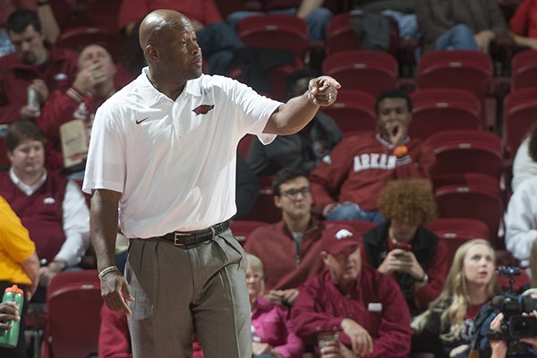 Arkansas head coach Mike Anderson calls to his team against Central Oklahoma in the first half Friday, Nov. 7, 2014 in Bud Walton Arena in Fayetteville.