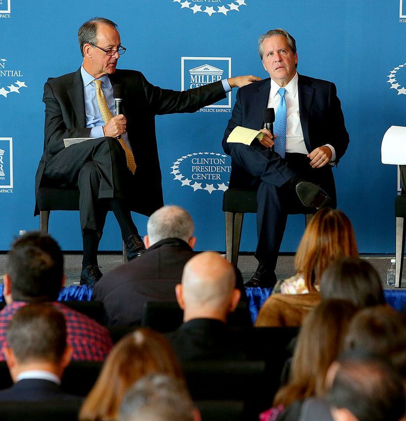 Bill Clinton’s former chief of staff, Erskine Bowles (left), and Clinton’s former economic council director, Gene Sperling, recount some of their federal budget battles during a panel discussion Friday at the Clinton Presidential Center. 