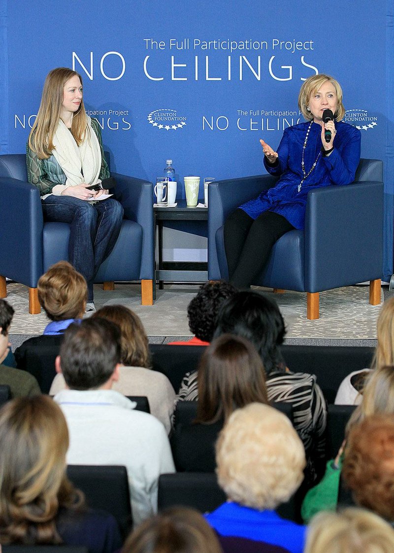 Clinton Foundation Vice Chairman Chelsea Clinton (left) and former Secretary of State Hillary Rodham Clinton discuss the foundation’s No Ceilings initiative Saturday at the Clinton Presidential Center.