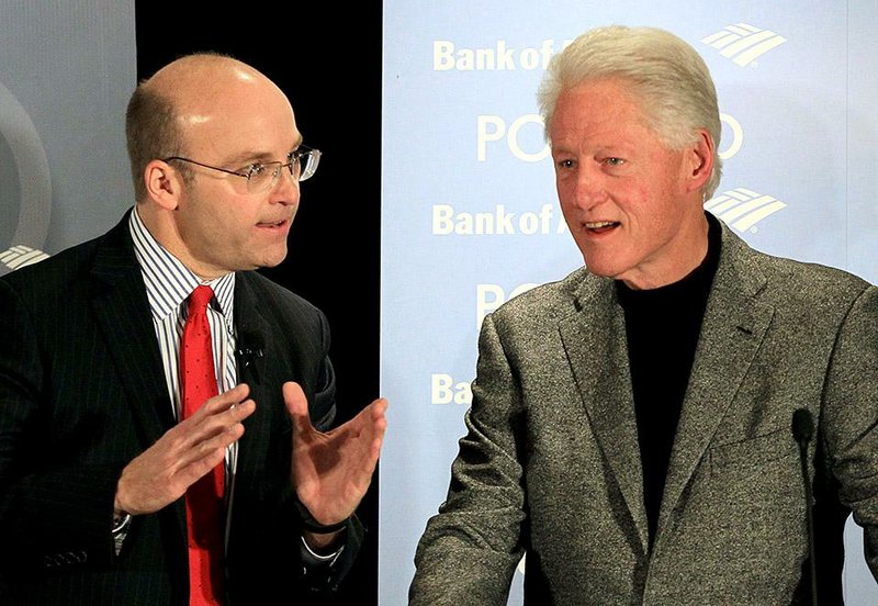 Politico’s Mike Allen (left) interviews former President Bill Clinton at a Little Rock event Saturday evening that included members of Clinton’s former White House staff.
