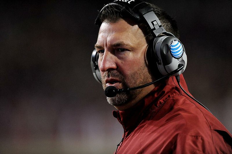 NWA Media/ANDY SHUPE - Arkansas coach Bret Bielema directs his players against LSU during the second quarter Saturday, Nov. 15, 2014, at Razorback Stadium in Fayetteville.