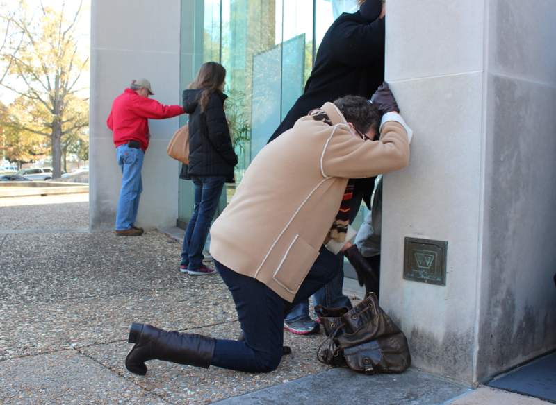 Barbara Matchett of Vilonia joins other opponents of gay marriage Wednesday in prayer outside the Arkansas Supreme Court.