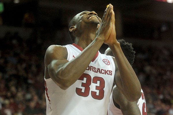 Arkansas center Moses Kingsley reacts to a call during a game against Delaware State on Friday, Nov. 21, 2014 at Bud Walton Arena in Fayetteville. 