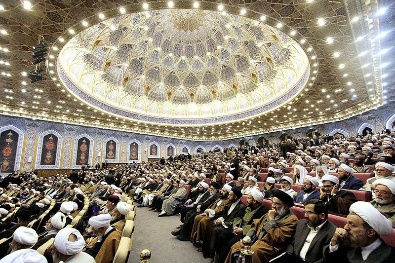 Participants sit in an anti-extremism conference in the city of Qom, 78 miles (125 kilometers) south of the capital Tehran, Iran, Sunday, Nov. 23, 2014. Shiite and Sunni clerics from about 80 countries gathered in Iran's holy city of Qom to develop a strategy to combat extremists including the Islamic State group that has captured large parts of Iraq and Syria. (AP Photo/Mehr News Agency, Zoheir Seidanloo)