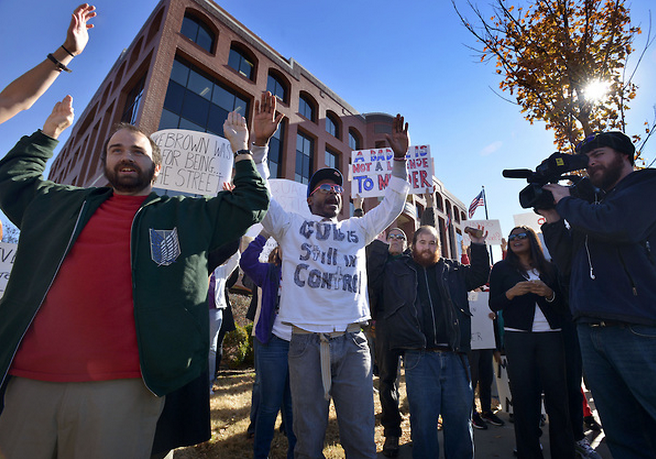 Four arrested in Fayetteville protest of Ferguson decision