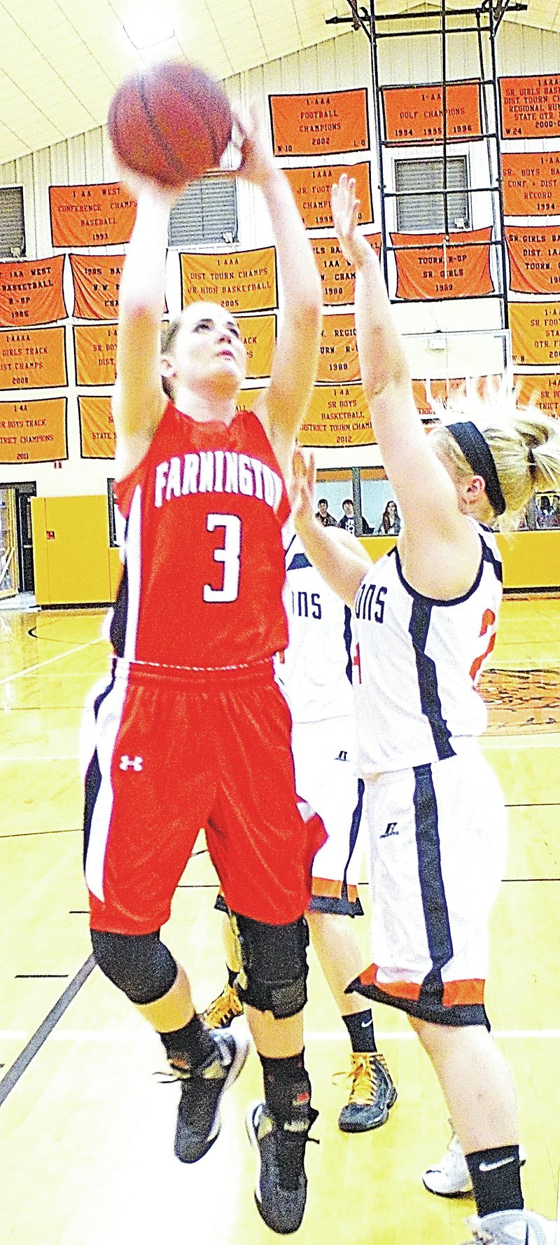  Staff Photo Randy Moll Kristi Duchanois, a Farmington senior, helped lead her team to a huge win in Gravette on Tuesday night.