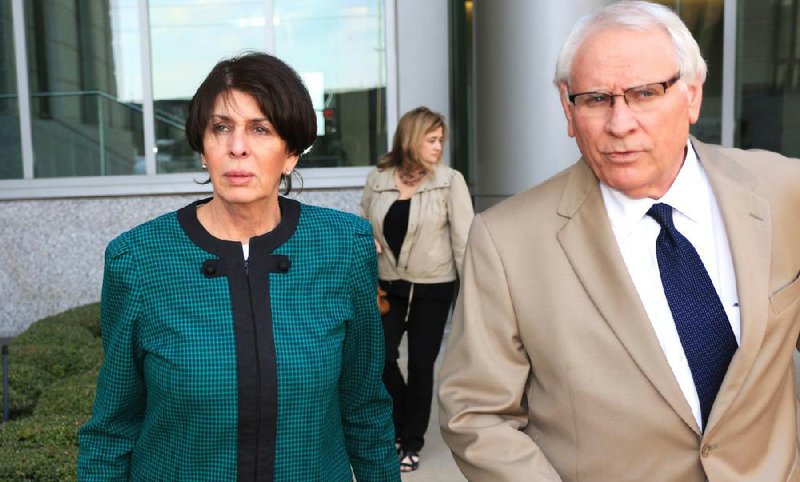 Martha Shoffner, former state Treasurer-left, leaves with her attorney Chuck Banks after she was found guilty in her bribery and extortion trial at the Federal Courthouse in Little Rock in this file photo.