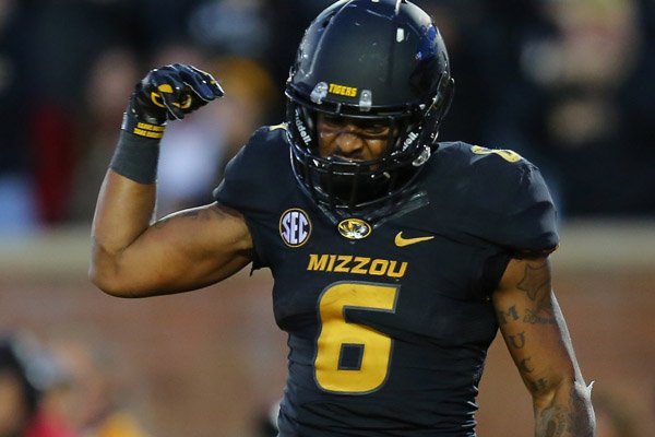 Missouri running back Marcus Murphy celebrates after scoring the go-ahead touchdown in the fourth quarter of a game against Arkansas on Friday, Nov. 28, 2014 at Faurot Field in Columbia, Mo. 