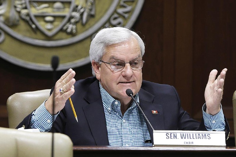 FILE — Eddie Joe Williams, then a Republican senator from R-Cabot, questions Arkansas Department of Correction officials during a joint meeting of House and Senate Committees on State Agencies and Governmental Affairs at the state Capitol in Little Rock in this Nov. 24, 2014. (AP Photo/Danny Johnston)