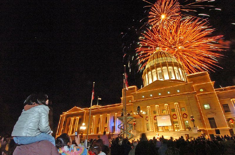 The Arkansas Capitol lighting ceremony finishes with fireworks after The Big Jingle Jubilee Holiday Parade in Little Rock on Saturday. 