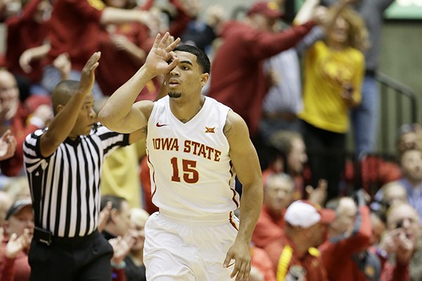 Iowa State guard Naz Long reacts after making a three-point basket during the first half of an NCAA college basketball game against Arkansas, Thursday, Dec. 4, 2014, in Ames, Iowa. (AP Photo/Charlie Neibergall)