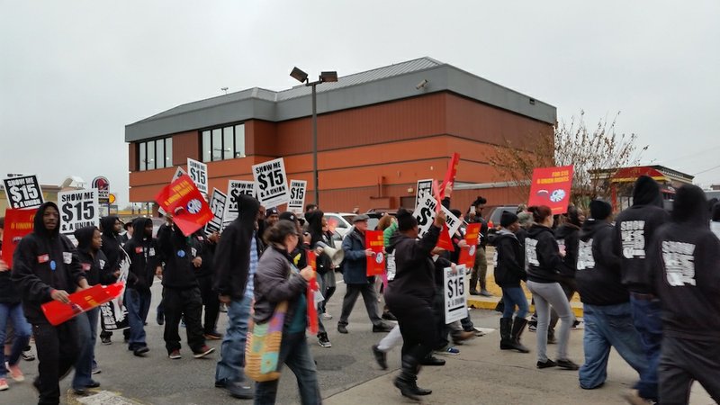 Fast-food workers protest Thursday, Dec. 4, 2014, demanding higher wages and a union, in downtown Little Rock.
