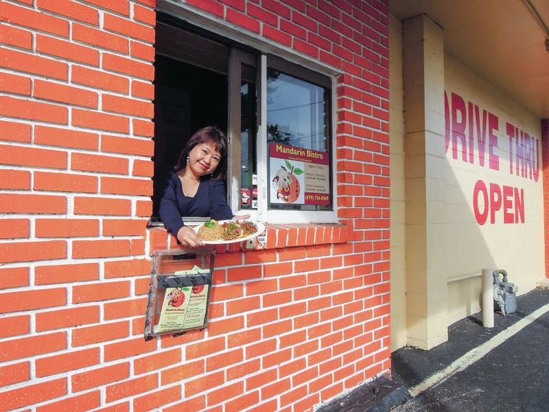 A drive-thru window provides customers with quick service of freshly prepared meals.