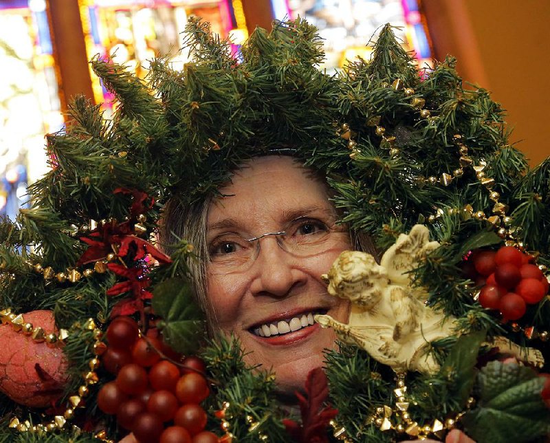 Arkansas Democrat-Gazette/JOHN SYKES JR. - Julie Cabe is the host for the tour of the quapaw quarter united methodist church. "Christmas at the Quarter" is organized by the church; it benefits from the proceeds.