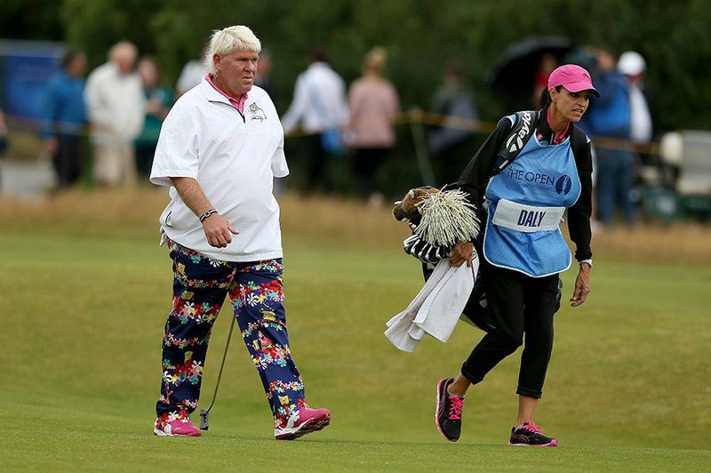 John Daly (left) announced Thursday he is engaged to his caddie Anna Cladakis. The marriage will be Daly’s fifth. 