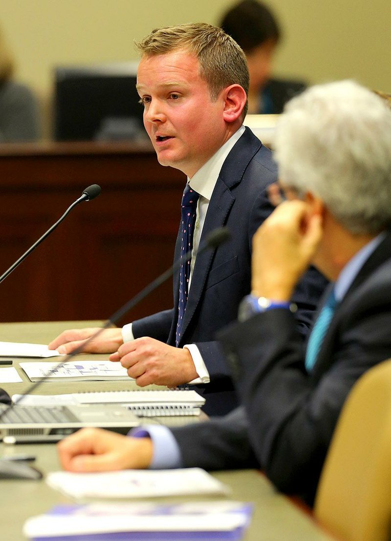 Richard Bateson, with Camelot Global Services, advises the Arkansas Lottery Commission Legislative Oversight Committee on Friday to work with political leaders to shore up the state’s lottery. 