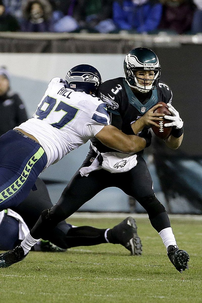 Philadelphia Eagles' Mark Sanchez is sacked during the second half of an NFL football game against the Seattle Seahawks, Sunday, Dec. 7, 2014, in Philadelphia. (AP Photo/Michael Perez)