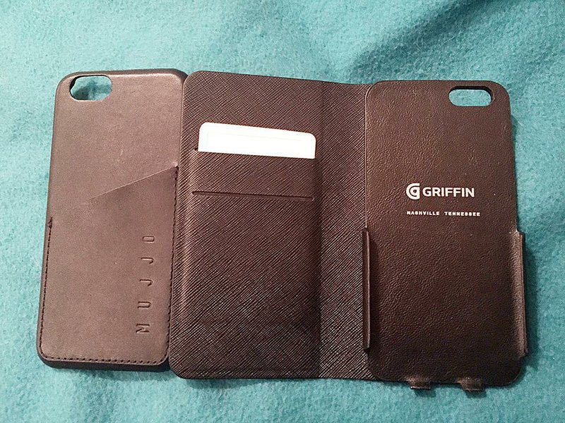 Special to the Arkansas Democrat-Gazette - 12/05/2014 - The Mujjo Leather Wallet Case (left) and the Griffin Technology Wallet Case offer a way to carry credit cards and an iPhone 6 at the same time. 
