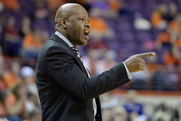Arkansas head coach Mike Anderson calls out a play during the first half of an NCAA college basketball game against Clemson, Sunday, Dec. 7, 2014, in Clemson, S.C.(AP Photo/Richard Shiro)