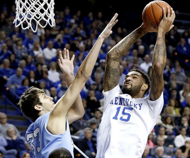 Kentucky’s Willie Cauley-Stein (15) shoots over Columbia’s Luke Petrasek during the first half of the top-ranked Wildcats’ 56-46 victory on Wednesday at Rupp Arena in Lexington, Ky. 