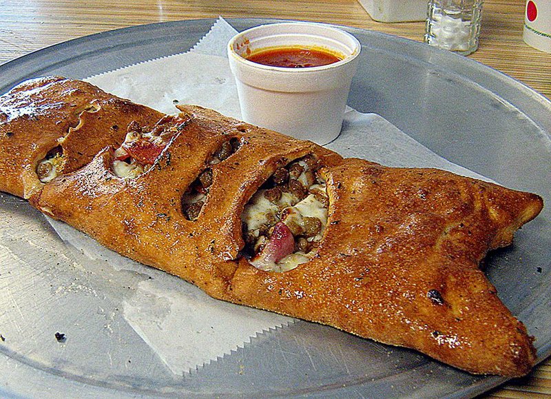 The stromboli at New York Style Pizzeria in Sherwood is filled with mozzarella, pepperoni, ground beef and Canadian bacon. 