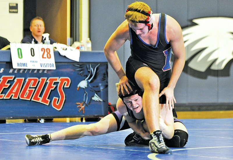 FILE Photo Dane Shields, bottom, of Fayetteville is one of several top area wrestlers who will compete in this weekend&#8217;s NWA Duals tournament at Springdale Har-Ber.