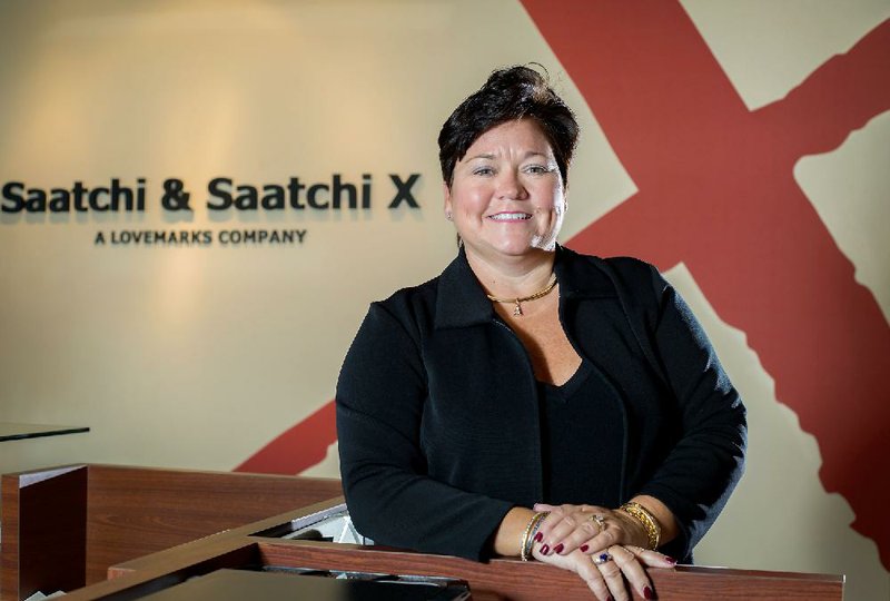 Dina Howell, Saatchi & Saatchi X chief executive officer; photographed on Thursday, Oct. 16, 2014, inside their Springdale office.