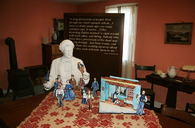 Mark Twain grew up in Hannibal, Mo., in the mid-1800s. The town on the Mississippi River inspired many of his most famous stories. In the Mark Twain Boyhood Home & Museum, a statue of Twain appears to play with some of the characters from his books. 