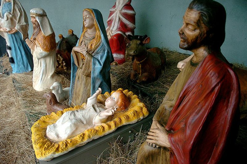 The statue of the baby Jesus rests in a manger as part of a Nativity scene at Basin Spring Park in Eureka Springs in 2009.