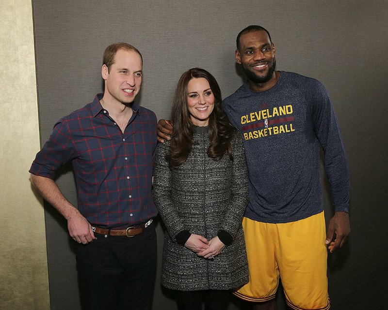 Cleveland Cavaliers forward LeBron James (right) has been criticized by the British media for hugging Duchess of Cambridge Kate Middleton (center) during her recent visit to the United States with her husband Prince William.