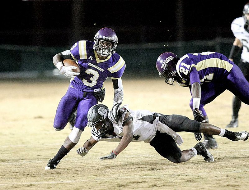 Junction City running back JaQwis Dancy (3) has rushed for 1,937 yards this season, helping lead the Dragons to a 12-0 record and a shot at their third consecutive state championship. 