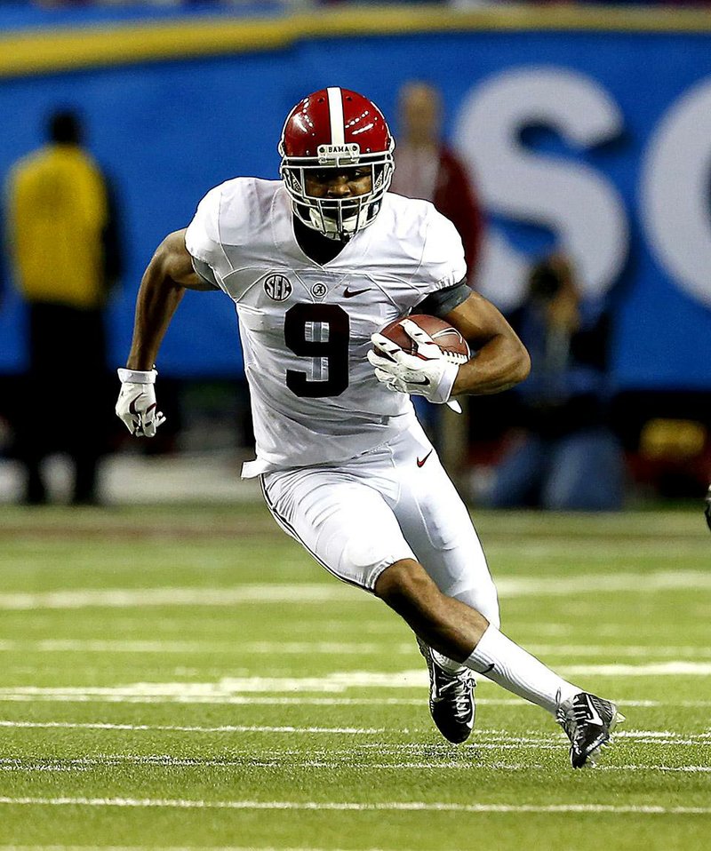 ALABAMA WR AMARI COOPER 115 catches, 1,656 yards, 14 TDs; 5 rushes, 23 yards; leads the nation with 127.4 yards receiving per game; set SEC mark for catches in a season
