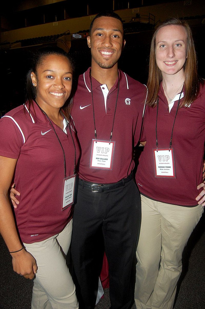 Trojan basketball players Taylor Ford, Ben Dillard and Hannah Fohne cq at SpectacUALR, a fundraiser for the University of Arkansas at Little Rock's  Trojan Athletics, Oct. 10 in the university's Jack Stephens Center.