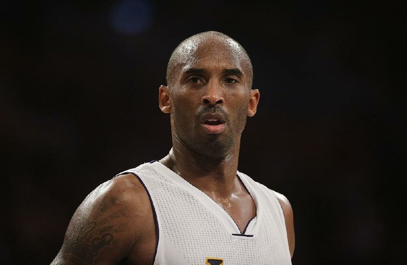Los Angeles Lakers' Kobe Bryant during the second half of an NBA basketball game against the Toronto Raptors Sunday, Nov. 30, 2014, in Los Angeles. The Lakers won 129-122 in overtime. (AP Photo/Jae C. Hong)