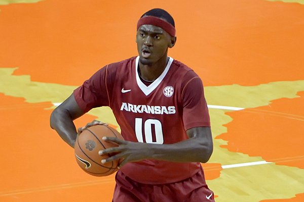 Arkansas's Bobby Portis looks for someone to pass to during the first half of an NCAA college basketball game against Clemson Sunday, Dec. 7, 2014 at Littlejohn Coliseum in Clemson, S.C.(AP Photo/Richard Shiro)