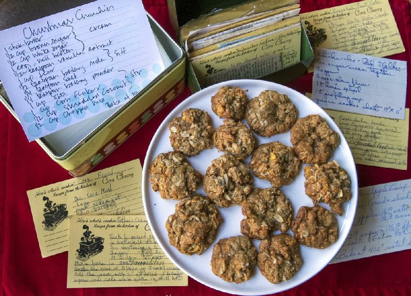 The recipe for Christmas Crunchies (cream 1 stick butter with ½ cup white sugar and ½ cup dark brown sugar; add 1 egg and ½ teaspoon vanilla extract; mix well. Stir together 1 cup flour, ½ teaspoon baking soda, ¼ teaspoon baking powder, ¼ teaspoon salt; add to creamed mixture. Stir in 1 cup oats, 1 cup cornflakes, ½ cup shredded coconut and ½ cup chopped pecans. Shape into small balls and bake 10 to 15 minutes at 350 degrees.) was among the many sweets in Cora Chacey’s recipe box. 