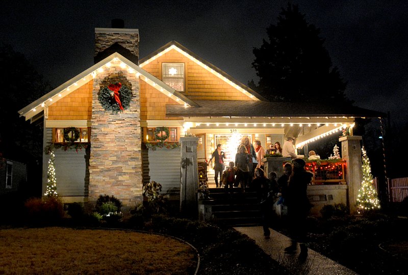 Janelle Jessen/Herald-Leader The home of Bill and Deanna Lisk was packed with people during the Christmas Home Tour on Dec. 5. The Lisk Home was one of five homes on the tour, designed as a fundraiser for the Mothering Matters Ministry of Siloam Springs Bible Church.