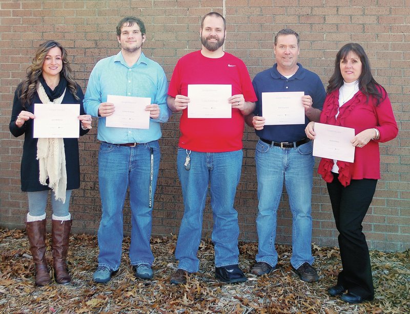 Submitted Photo Three staff members at Gentry Schools &#8212; Jenni Morris, K-5 technology facilitator (left), Craig Millsap, Internet technology network administrator (center), and Phyllis Berry, 6-12 technology facilitator (right), attended a Google Apps event in Conway. They were trained and tested in the use of Google&#8217;s Gmail, Calendar, Docs and Drive sites in order to be a &#8220;Google Educator.&#8221; Connor Willett, technology technician (second from left), and Patrick Lanford, GHS teacher (second from right), both have also taken and passed the tests to be a &#8220;Google Educator.&#8221;