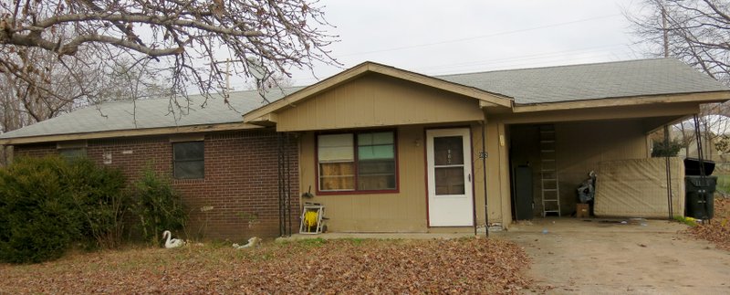 Photo by Susan Holland A Gravette man was arrested after a search of this home, at 902 Fourth Ave. S.W., revealed drug paraphernalia and suspicious devices suspected to be pipe bombs. The devices were later determined not to be explosives.