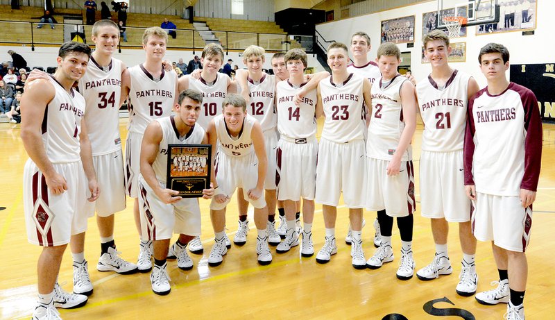 Bud Sullins/Special to the Herald-Leader The Siloam Springs boys basketball team defeated Catoosa, Okla., 64-51, on Saturday in the consolation finals of the Jerry Oquin Invitational in Inola, Okla. The Panthers (5-3) host Rogers Heritage at 7:30 p.m. on Friday at the Panther Activity Center.