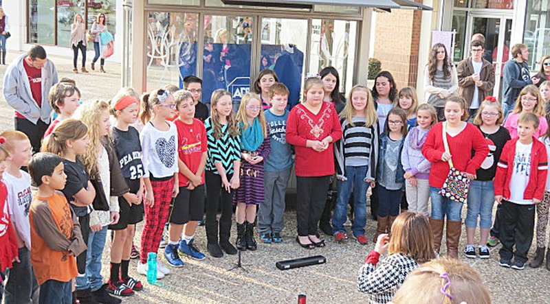 Photograph submitted Members of the Pea Ridge Intermediate School Choir directed by Mrs. April Smith sang at Promenade Mall in Rogers.