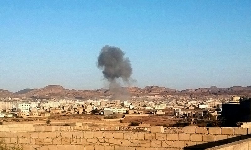 Smoke rises from the site of a car bomb explosion in Radda town,100 miles (160 kilometers) south of the capital Sanaa, Yemen, Tuesday, Dec. 16, 2014. Two suicide car bombers rammed their vehicles into a Shiite rebels checkpoint and a house south of the Yemeni capital Tuesday, as a school bus traveling nearby killing at least 25 dead including at least 15 primary school students, Defense Ministry, rebels and witnesses.