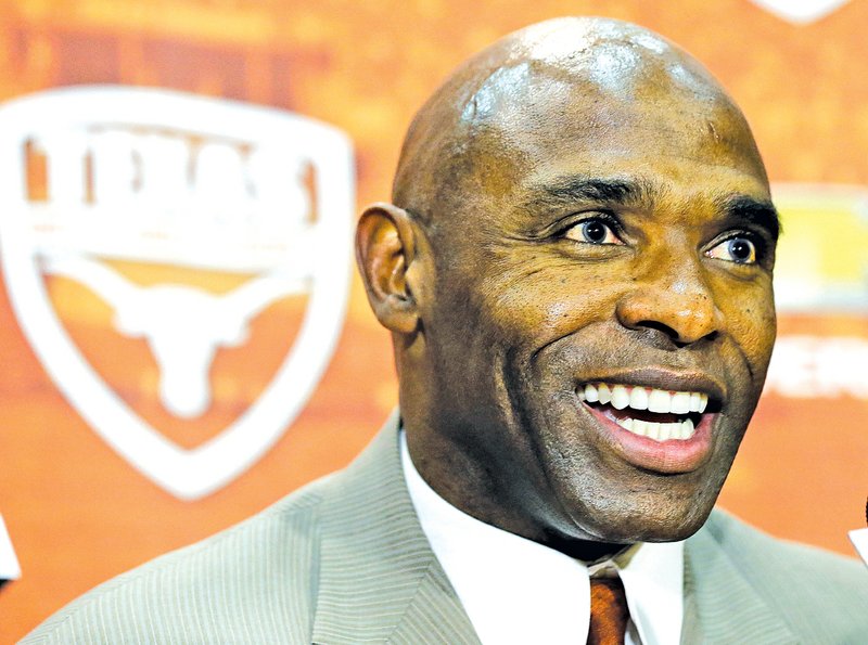 File Photo Charlie Strong, the first-year coach, and several Texas players met with the media in Austin, Texas, on Tuesday.