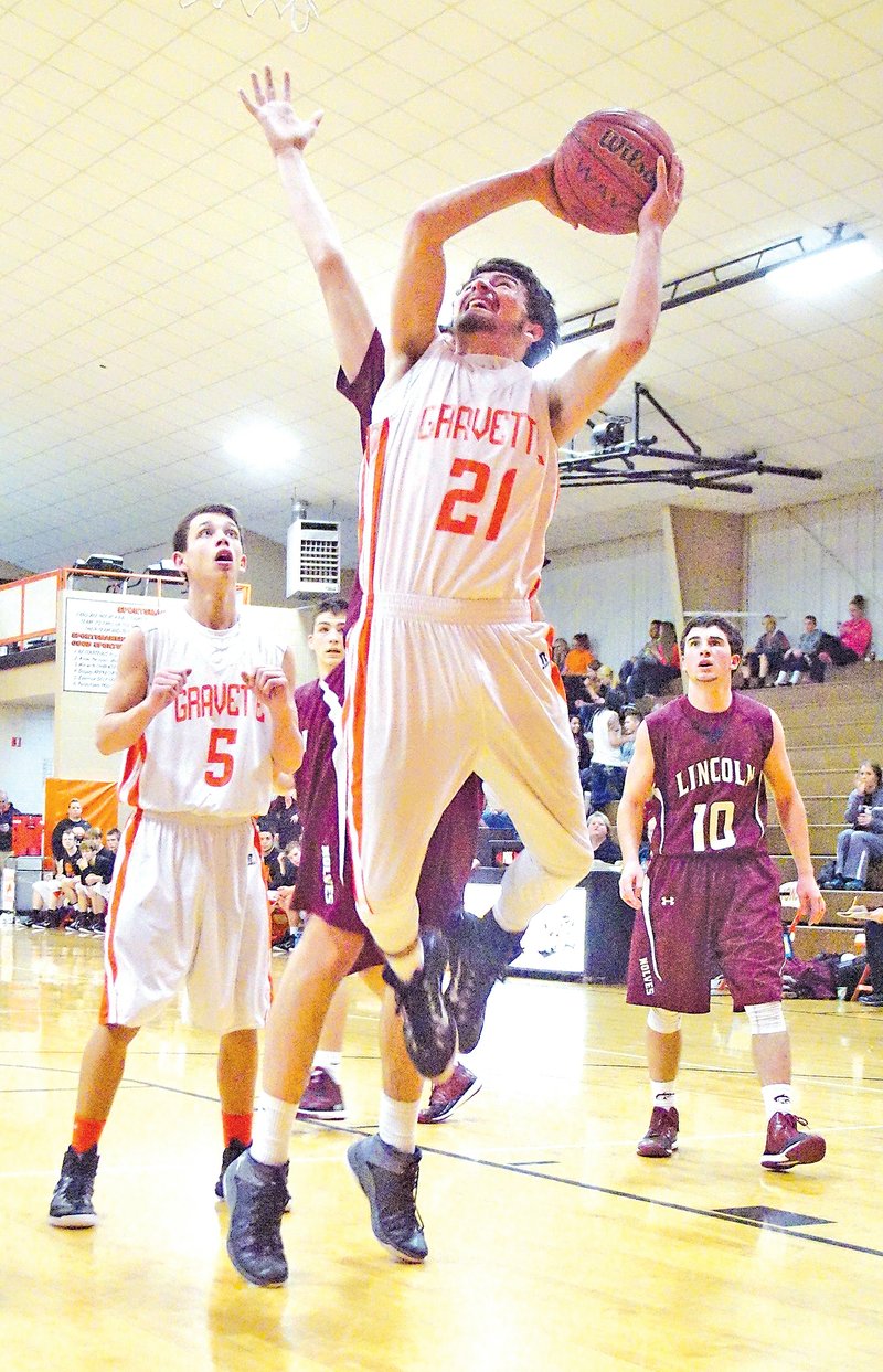  Staff Photo Randy Moll Dustin Morgan, Gravette junior, goes up for a shot against Lincoln at Lion Fieldhouse on Tuesday.