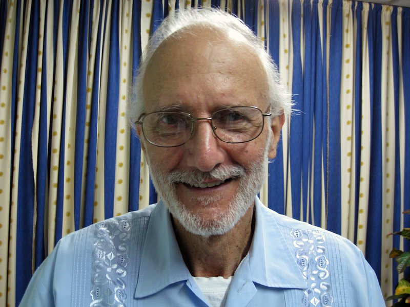 In this Nov. 27, 2012, file photo provided by James L. Berenthal, jailed American Alan Gross poses for a photo during a visit by Rabbi Elie Abadie and U.S. lawyer James L. Berenthal at Finlay military hospital as he serves a prison sentence in Havana, Cuba. 