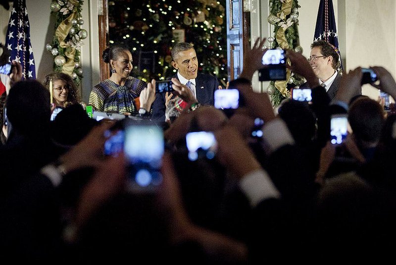 President Barack Obama and his wife, Michelle, attend the first of two Hanukkah receptions held Wednesday at the White House. 