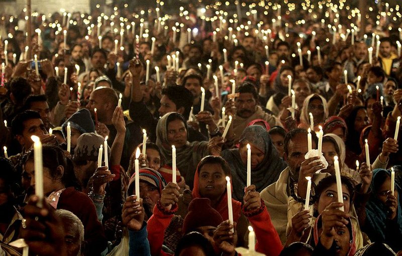 Pakistani Christians in the city of Lahore hold a candlelight vigil Wednesday for the victims of Tuesday’s Taliban assault on a school in Peshawar that left 148 people dead, most of them young students. As parents buried their children, the government vowed to root out militant strongholds.  