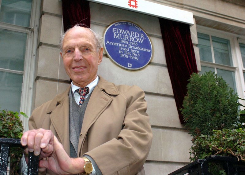 In this Feb. 15, 2006 file photo, An English Heritage Blue Plaque is unveiled for American broadcaster Edward R. Murrow by fellow reporter Richard C. Hottelet at Weymouth House, Hallam Street, in London, where he lived  from 1938-1946 during the blitz.  Hottelet, the last of the original "Murrow's Boys," the pioneering group of wartime journalists hired by CBS radio newsman Edward R. Murrow, has died. 