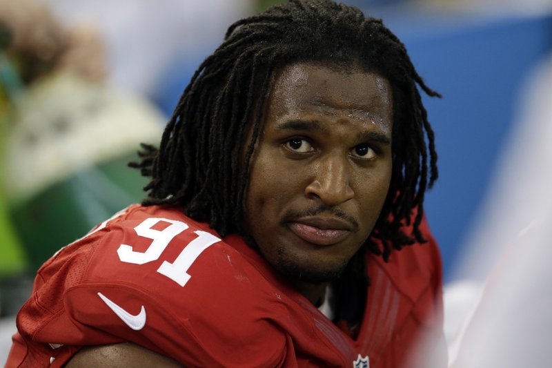 In this Sept. 7, 2014, file photo, San Francisco 49ers' Ray McDonald sits on the bench during the second half of an NFL football game against the Dallas Cowboys in Arlington, Texas. Northern California authorities are investigating 49ers defensive lineman Ray McDonald on suspicion of sexual assault. San Jose Police Department Sgt. Heather Randol said Wednesday, Dec. 17, 2014, that detectives searched McDonald's San Jose home. 